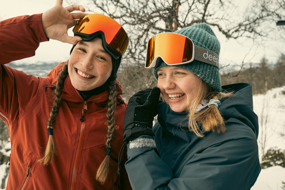 Two women with deep skigoogles on their head